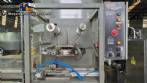 Engemaq automatic sealer for jars, bottles, and cups with plastic seal, 900 jars per hour.
