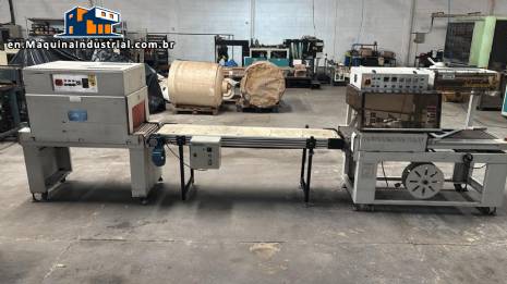 Automatic L-sealer with shrink tunnel.