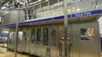 Tetra Pak A3 aseptic filling machine with cardboard packer 70 and tray shrink 51.