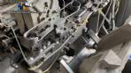 Tetra Pak A3 aseptic filling machine with cardboard packer 70 and tray shrink 51.