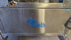 Automatic self-adhesive labeling machine for cylindrical bottles