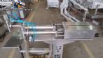 Semi-automatic pneumatic liquid filling machine with two nozzles