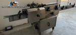 Krones Rotina II automatic labeling machine for cylindrical glass bottles and bottles.