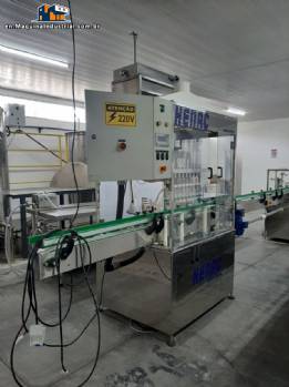 Linear filling machine with 12 filling nozzles