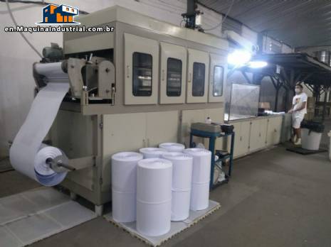 Automatic machine for manufacturing plastic cups