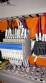 Pick and place product feeder for flowpack transfer cartoning machine