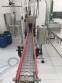 Line for brine filling manual product insertion and automatic capping