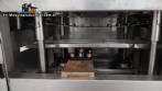 Line for brine filling manual product insertion and automatic capping