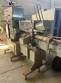 Automatic cartoning or case-packing machine for cartons or cardboard boxes