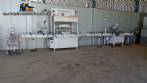 Linear filling machine with stainless steel threading machine 12 Narita nozzles