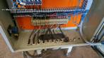 Stainless steel mixer with conveyor belt