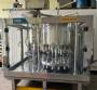 Packaging line with IMSB bung capper, Maqmundi labeler and accumulator table