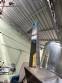 Packaging line with IMSB bung capper, Maqmundi labeler and accumulator table