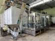 Packaging line with IMSB bung capper, Maqmundi labeler and accumulator table