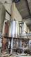Gravimetric rotary filling machine in stainless steel with cabin