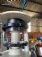 Gravimetric rotary filling machine in stainless steel with cabin