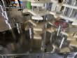 Gravimetric rotary filling machine in stainless steel with cabin