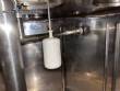Gravimetric rotary filling machine in stainless steel with cabin
