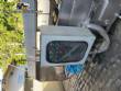 Filling line for 10 and 20 liter gallon jugs with filling machine and rinser/washer.