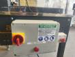Adhesive tape case sealer with safety enclosure and door sensors Strapack