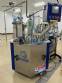 Rotary filling machine with Bramak aa jar capping sealer