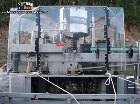 Krones automatic rotary label applicator for paper labels.