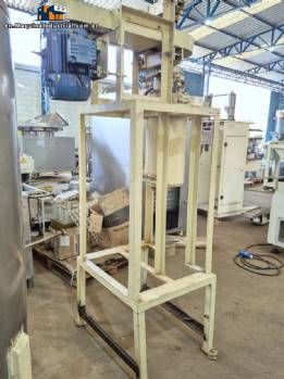 Chocolate, coating, and paste refining unit, 300 kg/cycle, with mill ladle and jacketed tank.