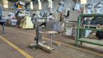 Semi-automatic stainless steel liquid filling machine with 1 nozzle.