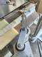 Labeling machine for dropper bottles with double printhead transparent stainless steel label