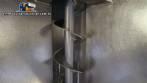 Inclined screw conveyor with stainless steel silo