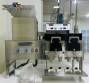 Capsule encapsulator, counter and polisher, capacity 22,000 capsules per hour.