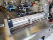Countertop stainless steel filling machine for liquids and viscous liquids