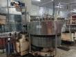 CompoMaq rotary filling machine with 42 nozzles and screw capper