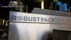 Labeling machine with steam sleeve tunnel and bottle baler