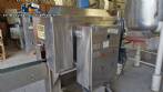 Labeling machine with steam sleeve tunnel and bottle baler