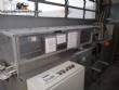 Horizontal cartoner with automatic crayon feeder
