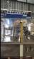 Zegla rotary filling machine with rinser and three-block capping system.