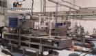 Automatic filling and sealing machine for gelatin cups, 12,000 units/hour.