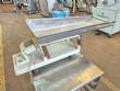 Vibrating trough for multi-head scale