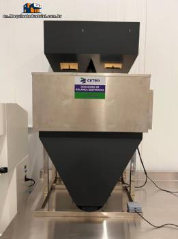 Cetro automatic dosing and weighing machine with 2 scales, 2 to 10 kg capacity, up to 40 packages per minute. Cetro automatic dosing and weighing machine with 2 scales, 2 to 10 kg capacity, up to 40 packages per minute.