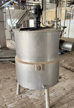 Jacketed mixing tank with heating element, made of stainless steel. Jacketed mixing tank with heating element, made of stainless steel.
